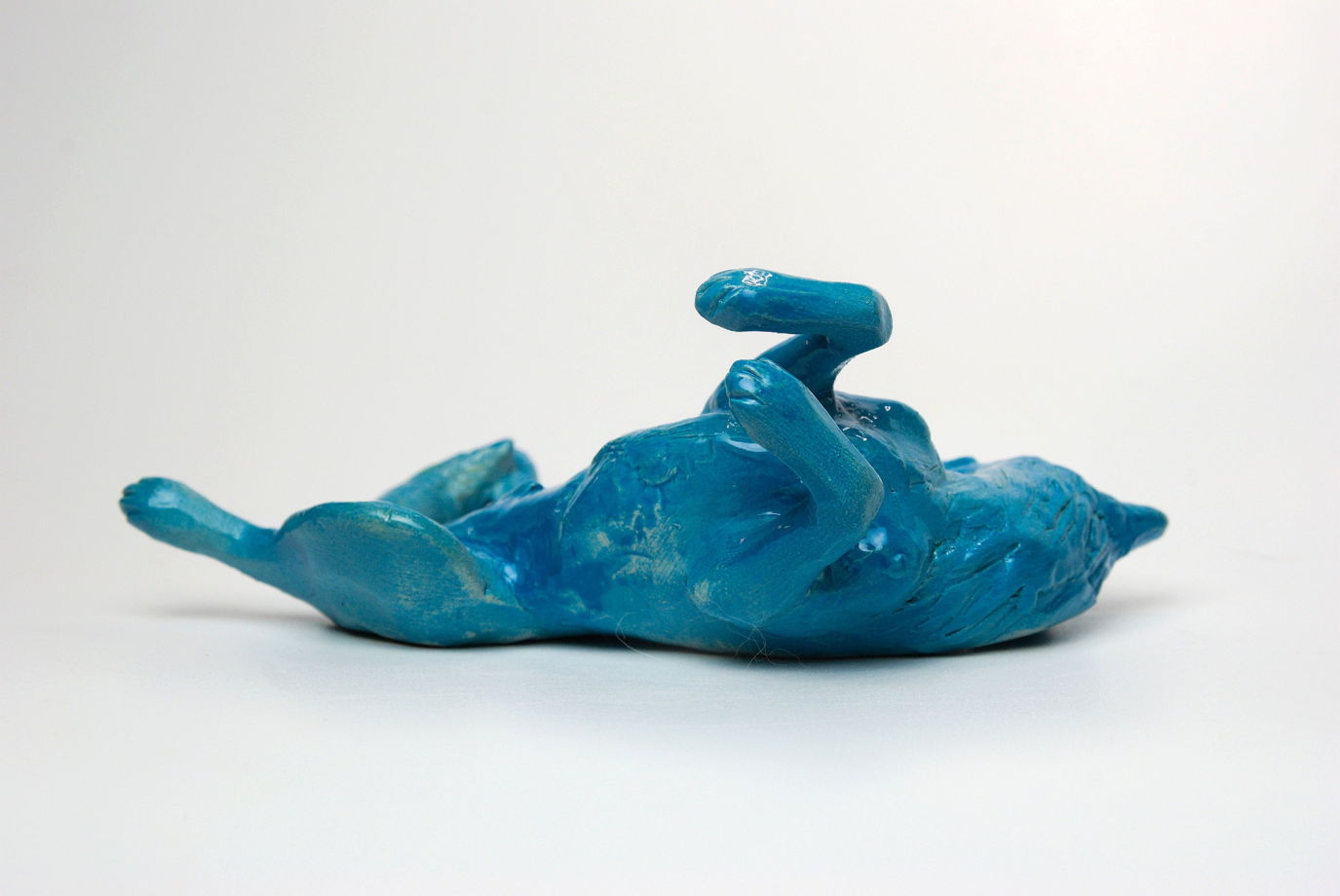 Спящая собака статуэтка