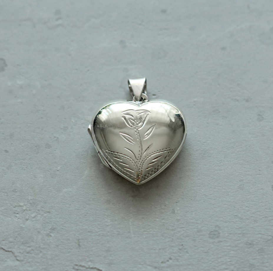 Открывающийся медальон сердце. Серебро 925 пробы.