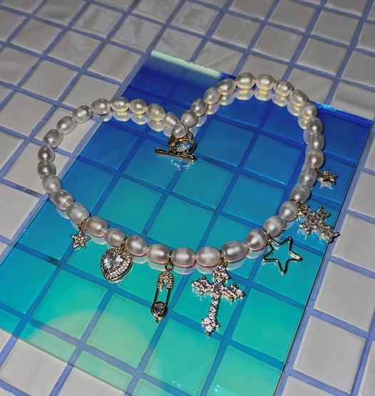 Ожерелье из жемчуга с множеством подвесок