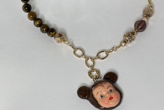Авторское украшение на шею « Пупс в шапке мишки»