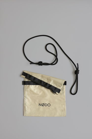 Повседневная сумка через плечо "ØA5 Nylon Ripstop" от NØDO бежевая