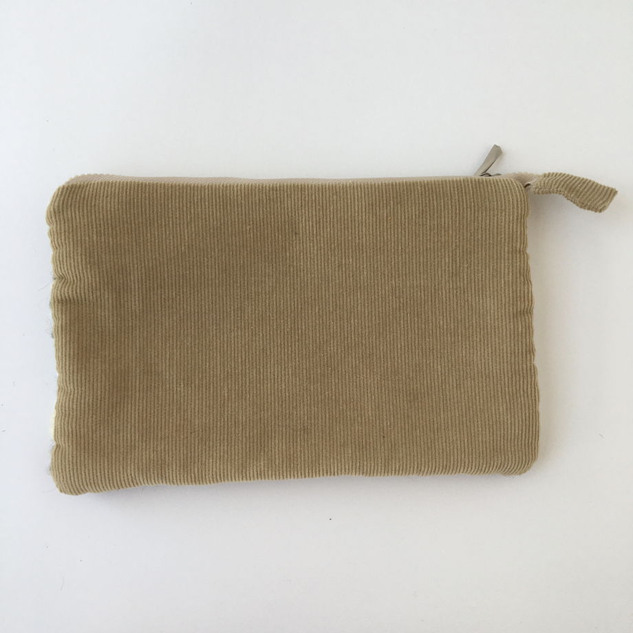 Бежевая тканая косметичка