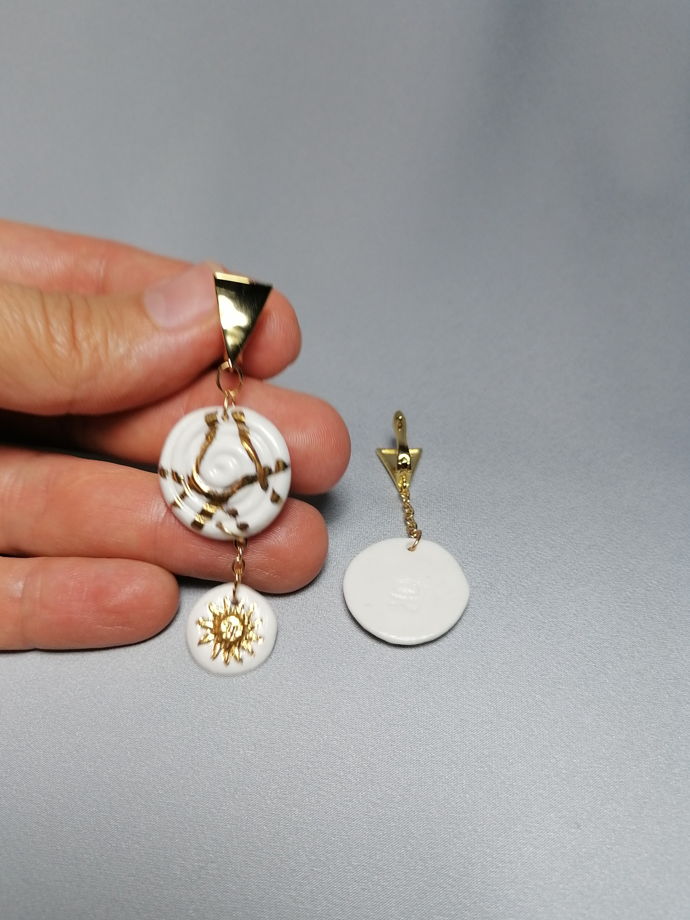 Серьги треугольники с подвеской Азия-Солнце