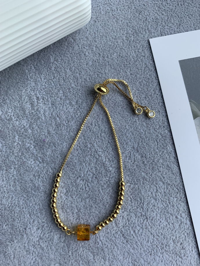 Браслет с натуральным янтарем и цирконами «Солнечная геометрия»