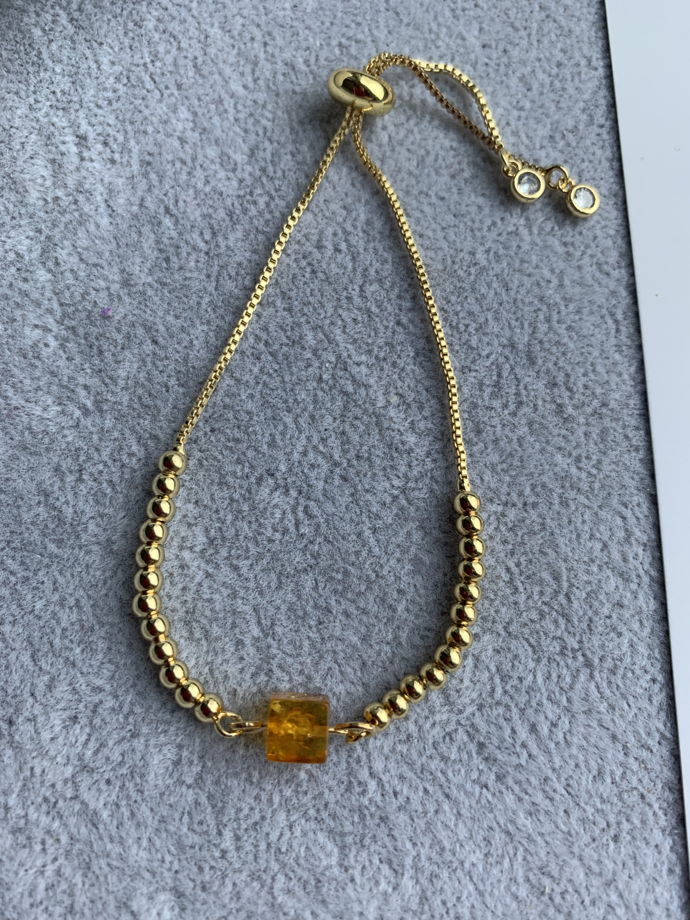 Браслет с натуральным янтарем и цирконами «Солнечная геометрия»