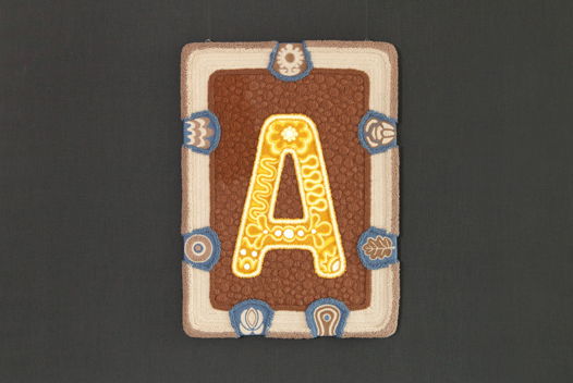 «За семью печатями» — панно в технике вышивки петлёй.