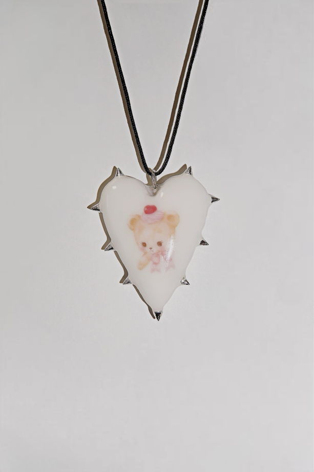 Кулон-перевёртыш в форме сердца с шипами