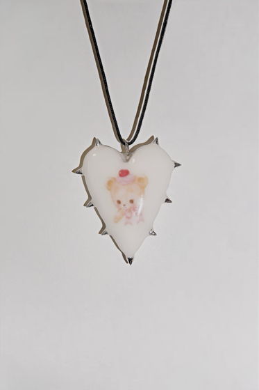 Кулон-перевёртыш в форме сердца с шипами