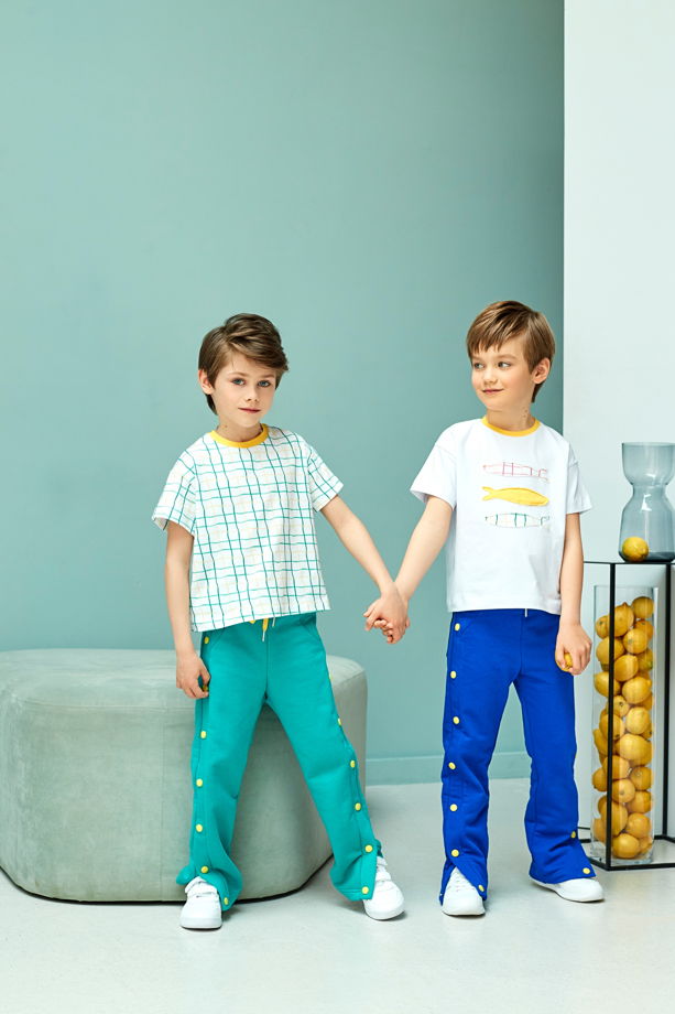 Спортивные брюки из футера изумрудного цвета для мальчика Star