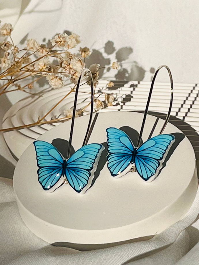 Серебряные серьги с голубыми бабочками из полимерной глины ручной работы
