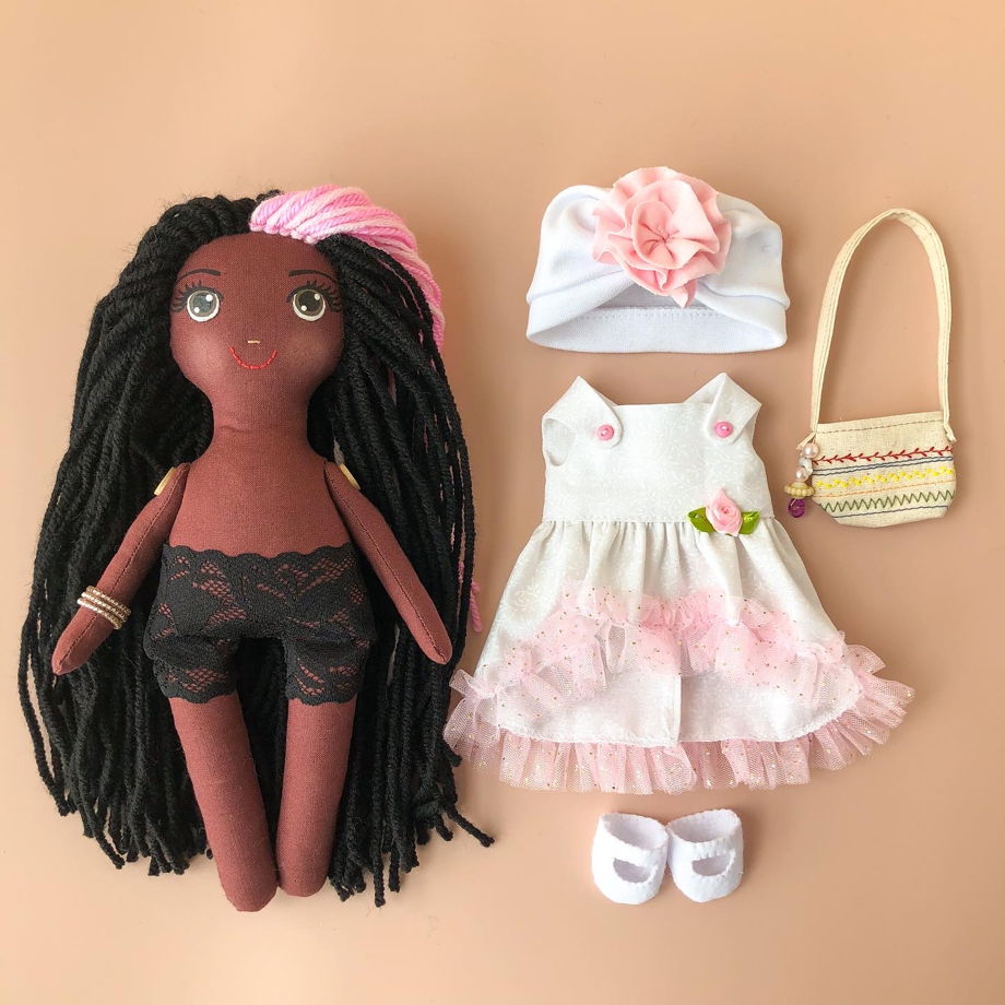 Текстильная игровая кукла негритянка с одеждой