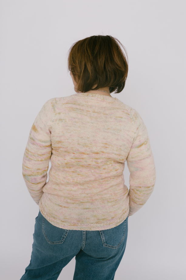 Женский свитер с ажурным рисунком из авторской пряжи, связан вручную