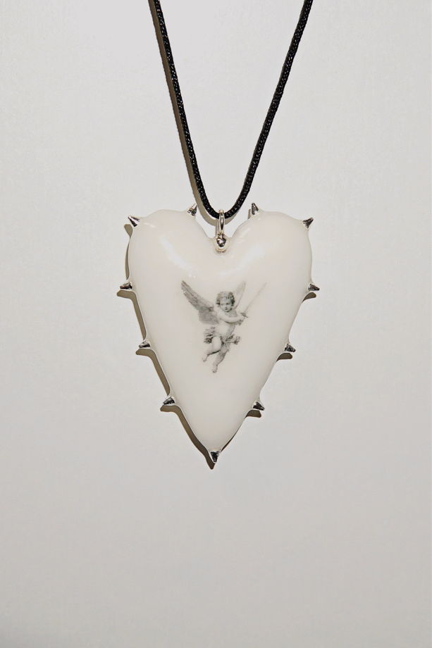 Кулон-перевёртыш в форме сердца с шипами